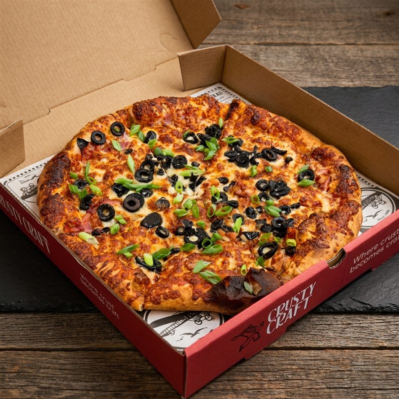Meat Lovers Pizza loaded with premium meats at CrustyCraft Pizza Transcona Winnipeg