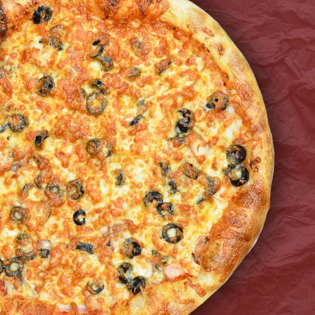 CrustyCraft Pizza hand-rolled European-style pizza ready for takeout in Transcona, Winnipeg